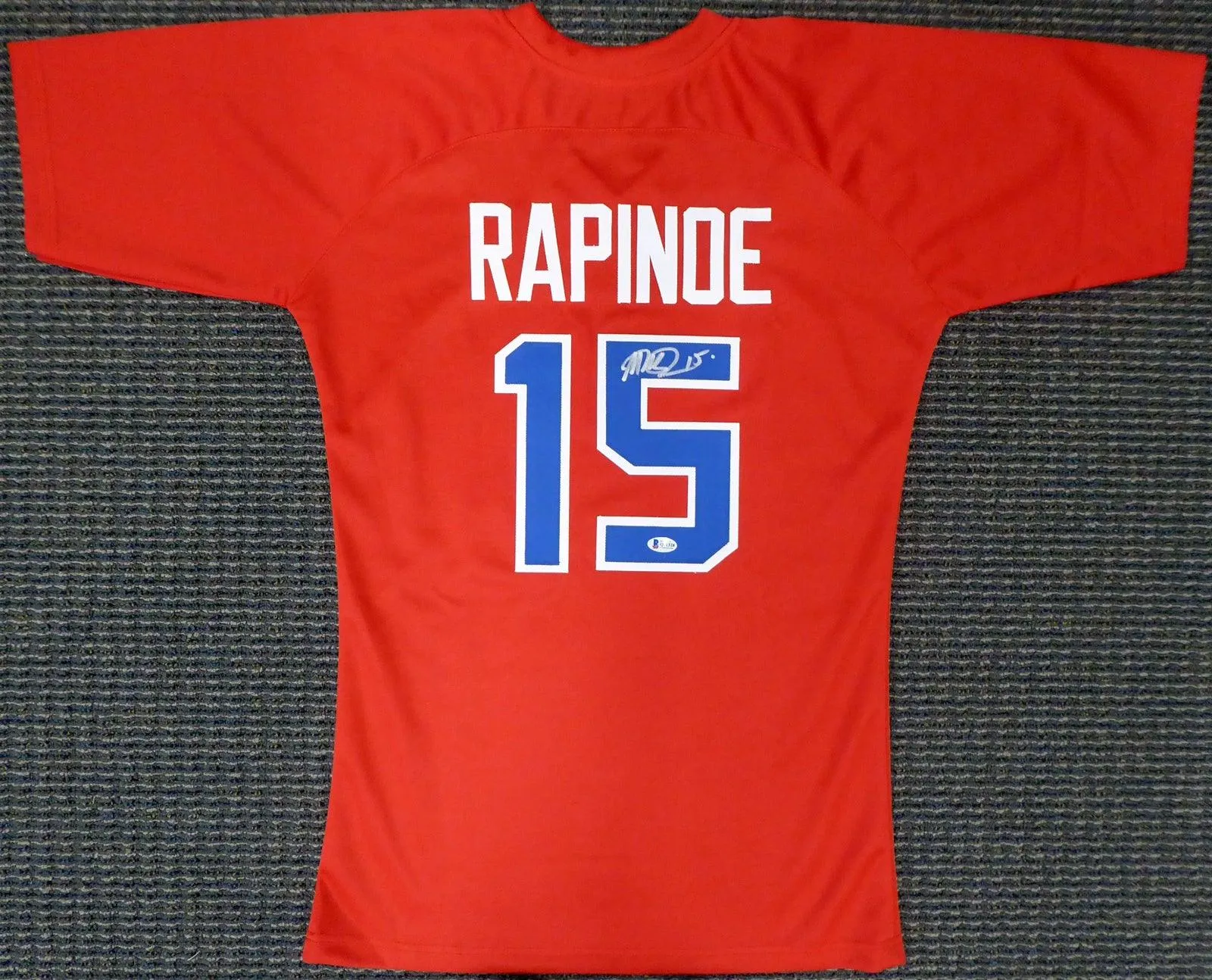 Team USA Megan Rapinoe Autographed Red Jersey Beckett BAS Stock #155791